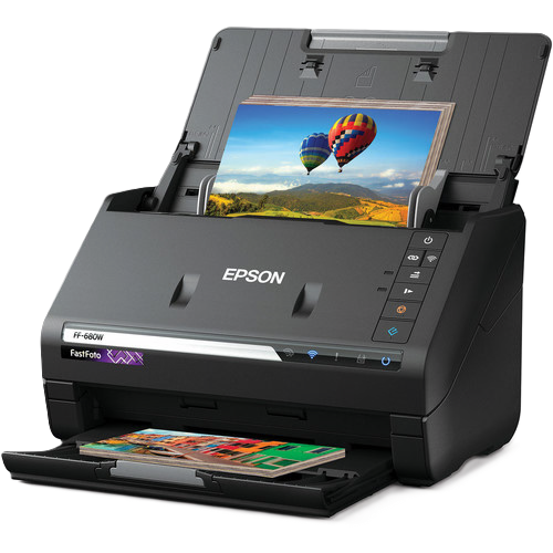 Scanner with a color photo being fed into the top