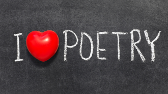 Chalkboard inscribed "I heart poetry"