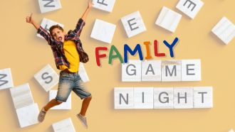 child leaps over "family game night" in scrabble tiles