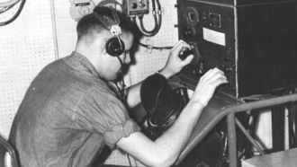 A Dayton codebreaker working on an enigma machine.