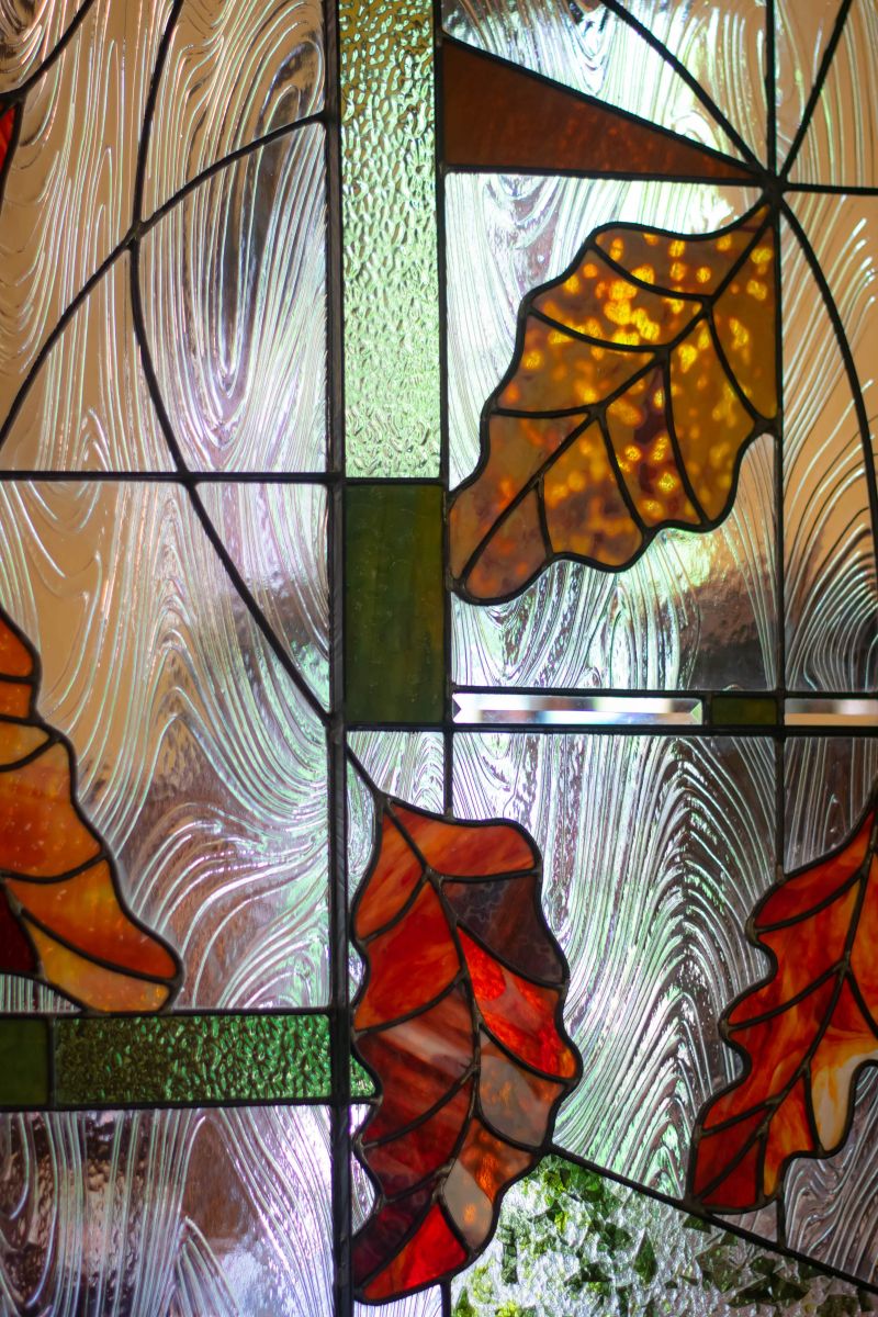 stained glass window design incorporating autumn oak leaves