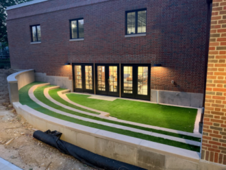 Outdoor learning extension of the children's room has turf