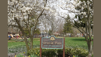Shafor Park in Oakwood Ohio. Trees, grass, and sign.