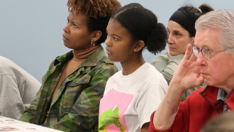 old, young, black, white people listening to conversation