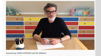 Mo Willems at a desk
